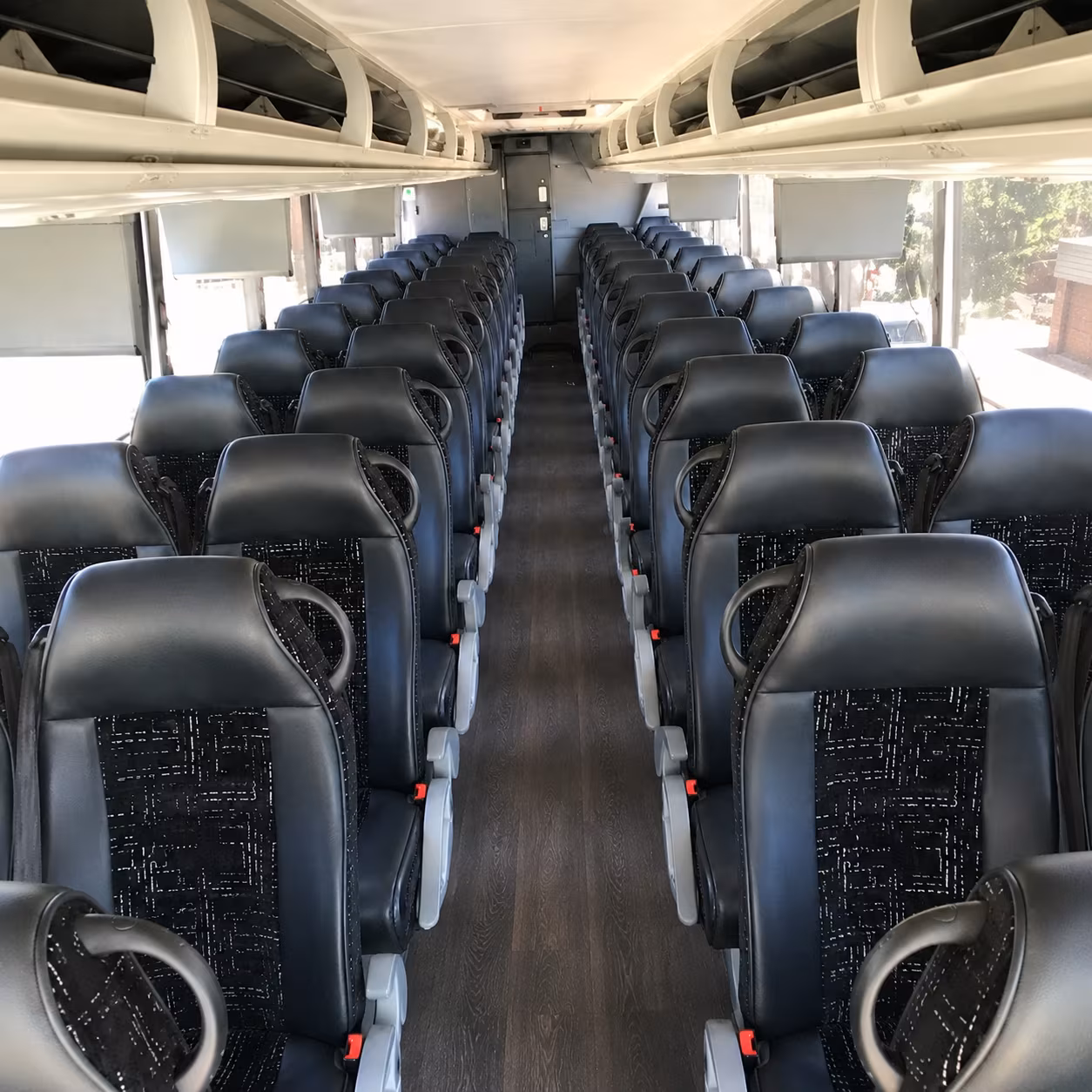 novi 56 passenger charter bus inside